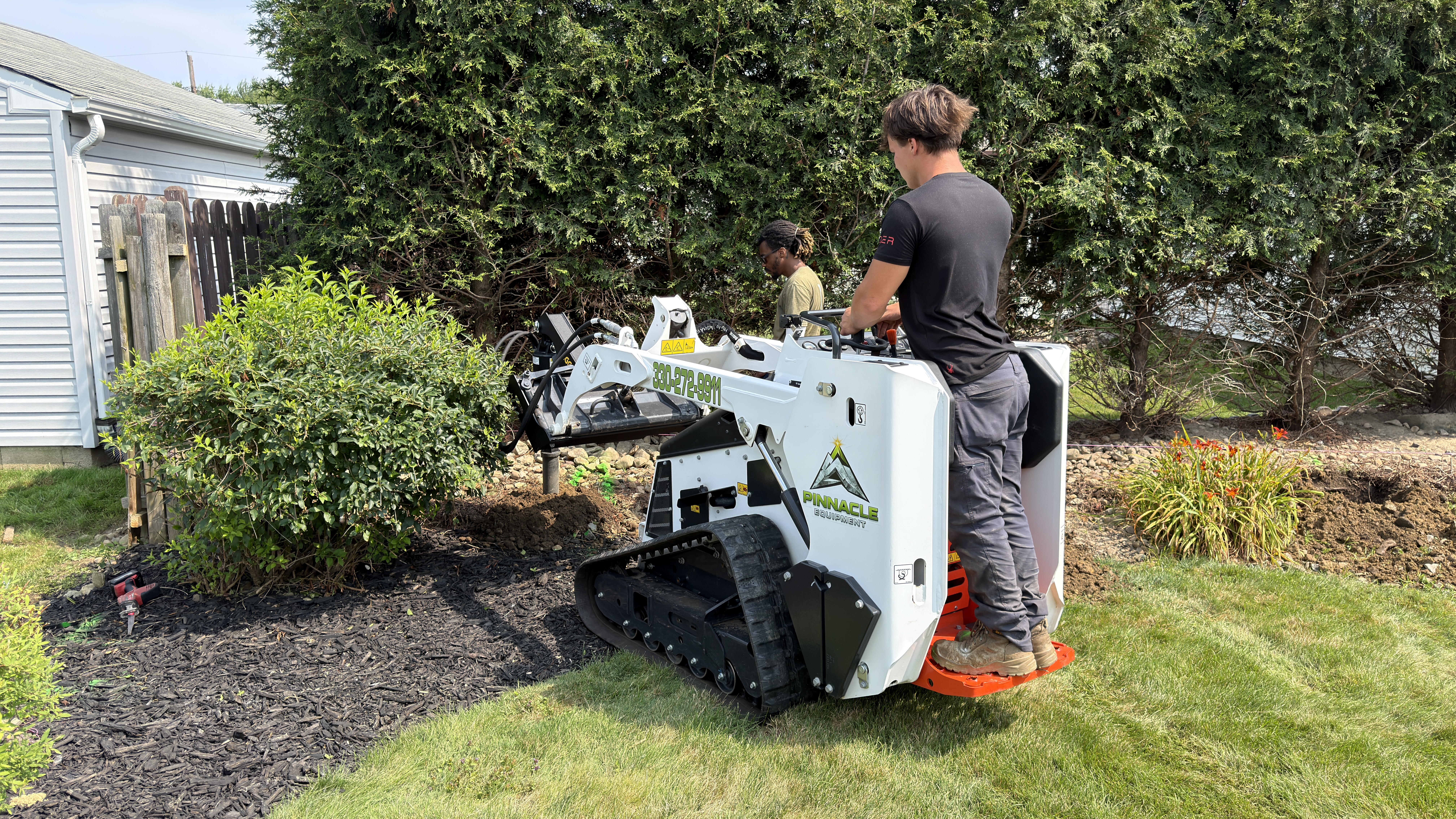 Mini skid steer rental working on a local property project in Northeast Ohio