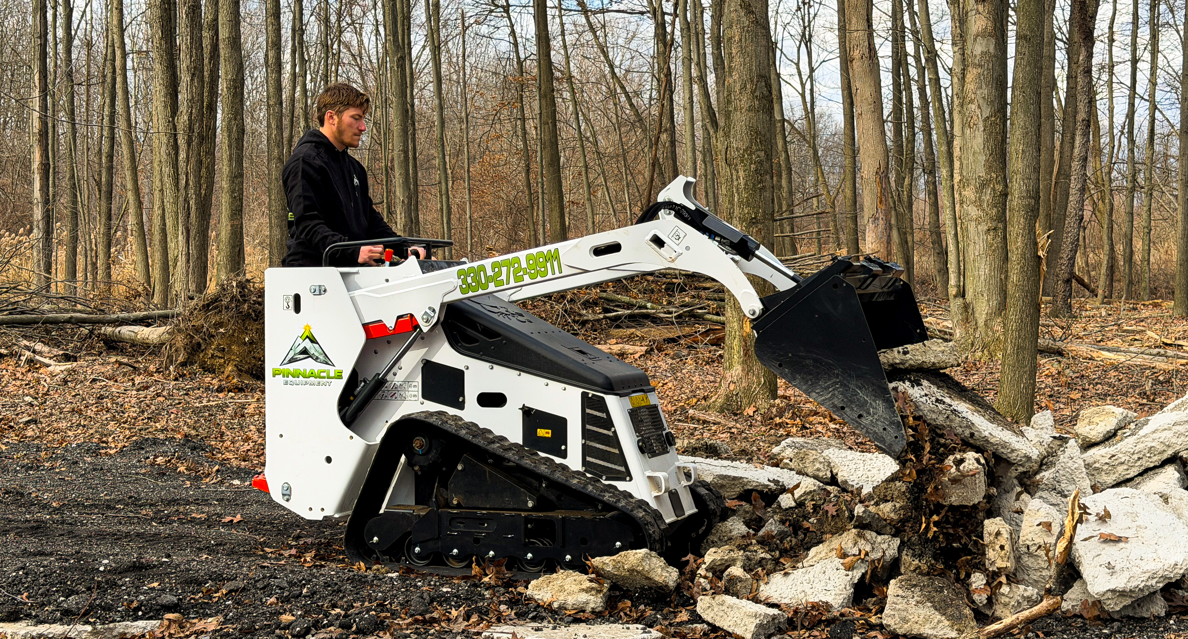 Bobcat MT100 mini skid steer working on site